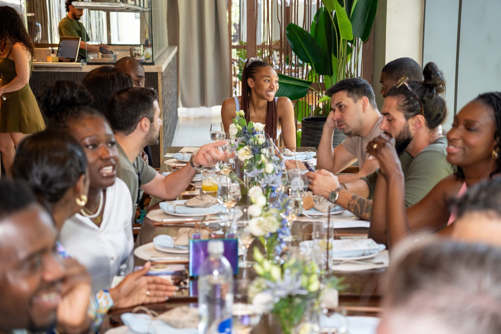 Guests seated around a styled private dining table